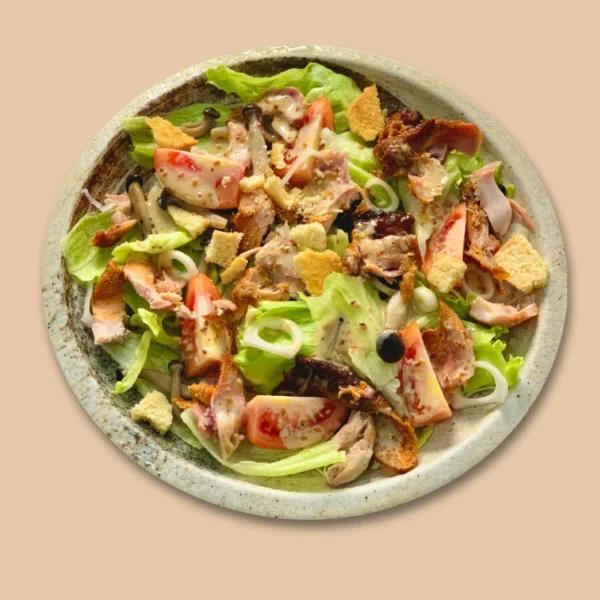 a bowl of Caesar Salad